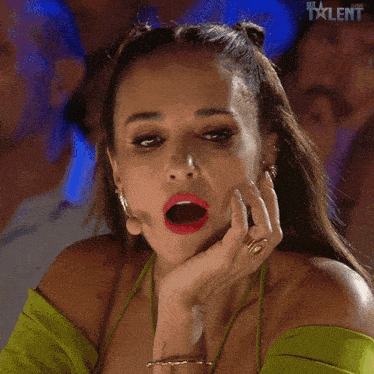 a woman with her mouth open and the word talent on the bottom left