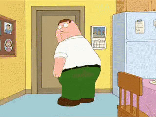peter griffin from the family guy is standing in a kitchen