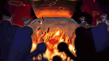 a group of people are sitting around a fire .