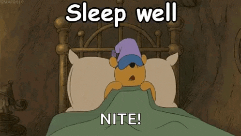 a cartoon of winnie the pooh sleeping in a bed with a sleep mask on .