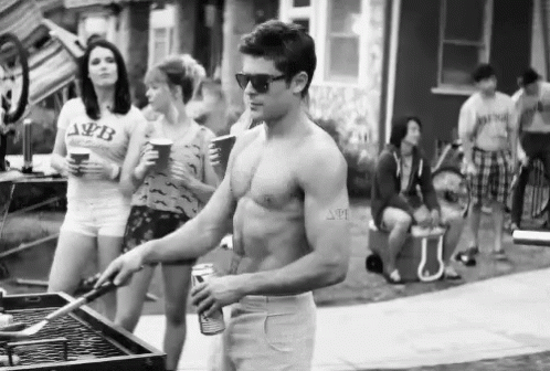 It'S Getting Hot In Here GIF - Zac Efron Grill Barbeque GIFs