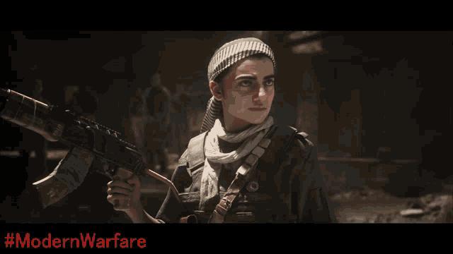 a man with a beard wearing a hat with #modernwarfare written in red