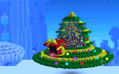 a christmas tree made out of blocks with a gift box in it