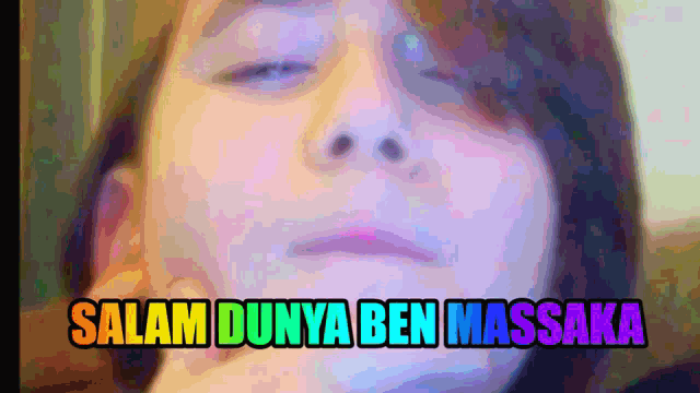 a close up of a person 's face with the words salam dunya ben massaka on the bottom