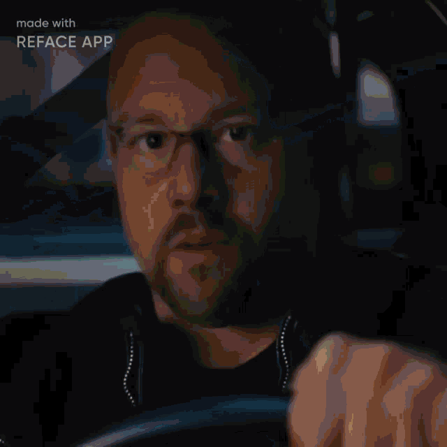 a man with a tattoo on his arm is wearing glasses and a white shirt made with reface app