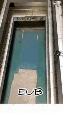 a large swimming pool with the word eub on the bottom