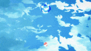 a blue and red balloon floating in the air
