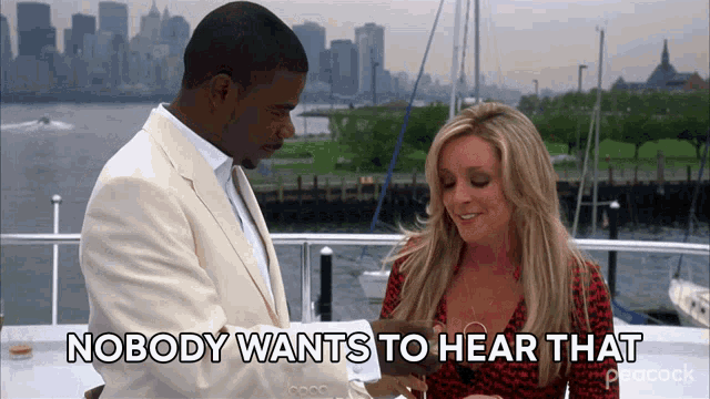 a man and woman on a boat with the words " nobody wants to hear that "