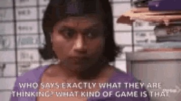 a woman in a purple shirt says who says exactly what they are thinking