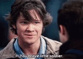 a man is talking to another man and saying you brave little soldier
