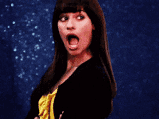 a woman with her mouth wide open looks surprised