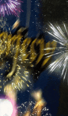 a fireworks display with the year 2022 written in the middle
