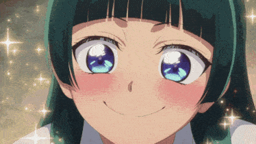a close up of a girl with blue eyes making a face
