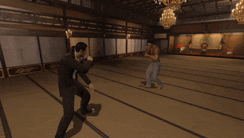 two men are fighting in a video game and one of them has a lightning bolt in his hand