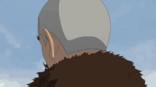 a man with a beard is wearing a fur collar