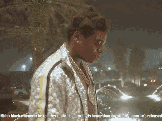 a picture of a man with the caption midak black whenever he realizes cole discography is better than any single album
