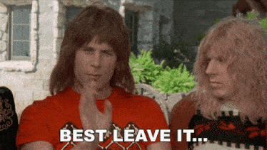 a man in a red shirt says " best leave it " next to another man