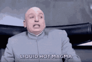 a bald man in a suit says liquid hot magma .