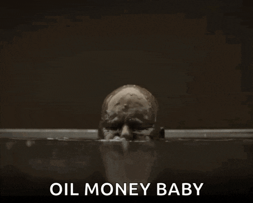 a man is covered in oil and the words oil money baby are below him
