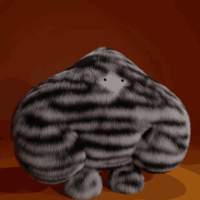 a stuffed animal that looks like a zebra with a white face
