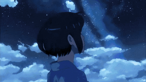 a girl in a blue kimono is looking up at the night sky