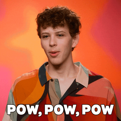 a man in a colorful shirt with the words pow pow pow behind him