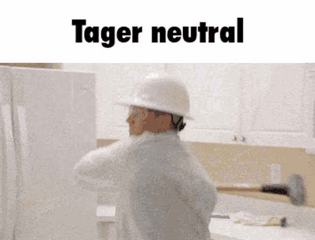 a man wearing a hard hat is holding a hammer in front of a white refrigerator and the words " tager neutral "