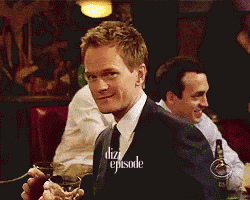 a man in a suit and tie is smiling and holding a glass with the words dizzy episode written on it