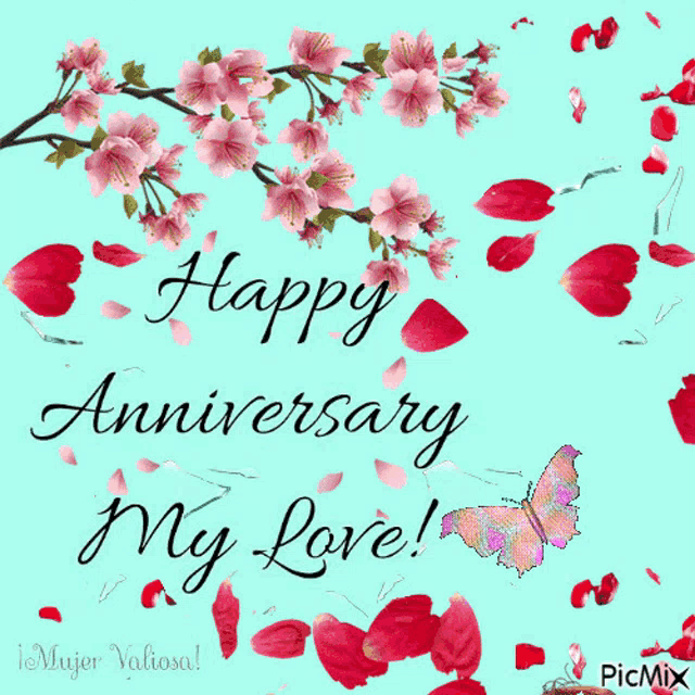 a happy anniversary card with flowers and petals