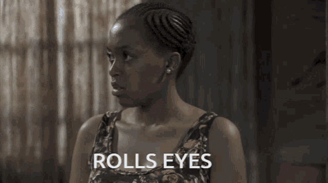 a woman in a floral dress says rolls eyes on the bottom