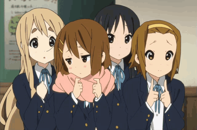 a group of anime girls standing next to each other with one girl holding a pink scarf around her neck