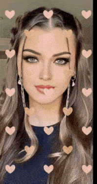 a close up of a woman 's face with hearts around her face
