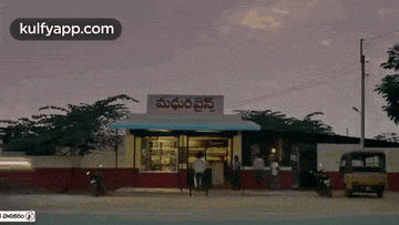 a building with a sign on it that says ' madurai ' on it