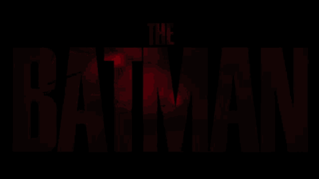 a dark background with the word batman in red letters
