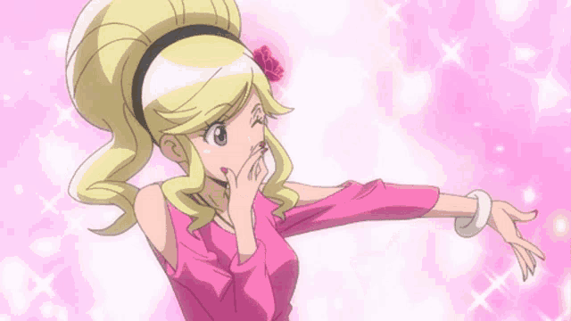a cartoon girl in a pink shirt is surrounded by pink hearts