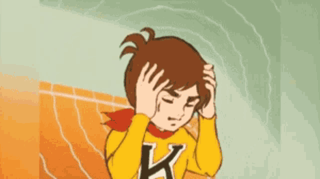 a cartoon character with the letter k on their shirt