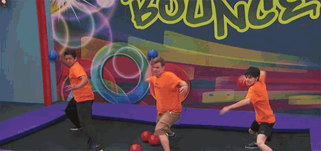 a boy wearing a blue shirt that says jumping jacks on it