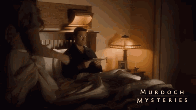 murdoch mysteries shows a man reading a book