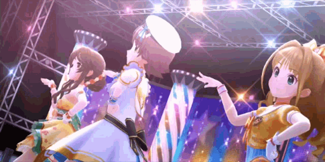 three anime girls are dancing on a stage .