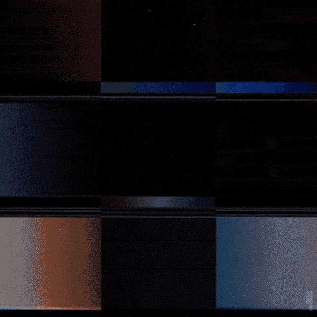 a black background with a few different colored squares