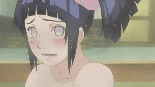 a naked anime girl with a flower in her hair looks sad
