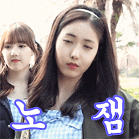 two girls are standing next to each other with asian writing on the bottom