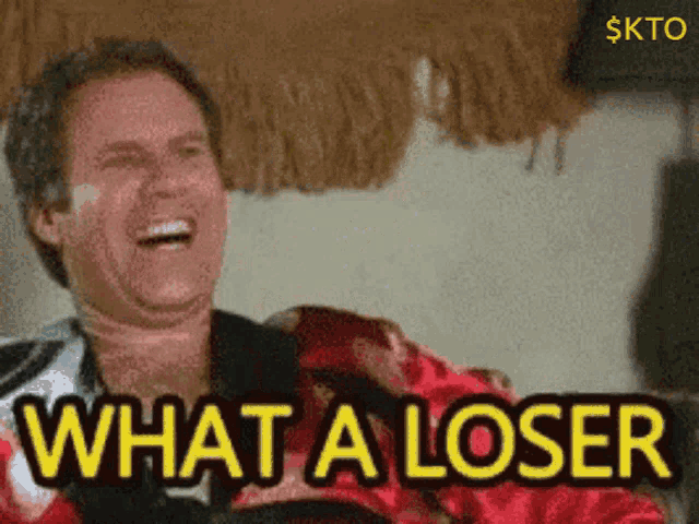 a man is laughing and the words what a loser are above him