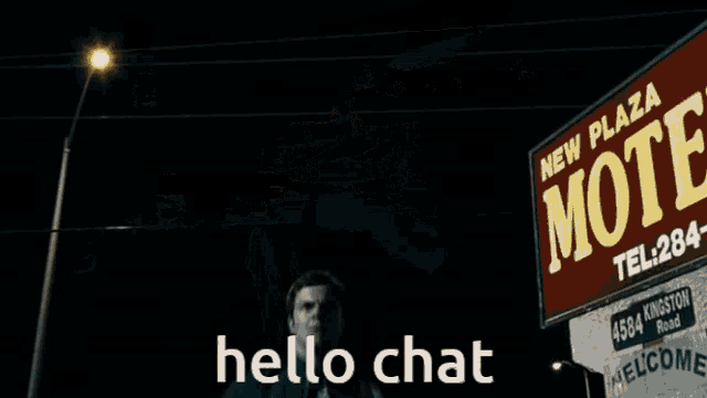 a motel has a sign that says hello chat
