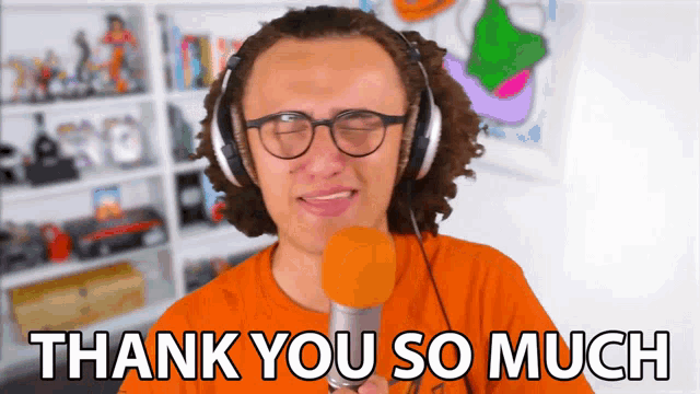 a man wearing headphones is singing into a microphone with the words thank you so much below him