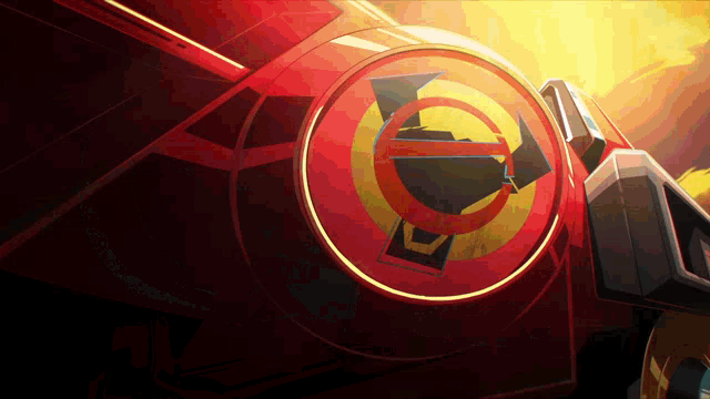 a red and yellow circle with a triangle in the middle