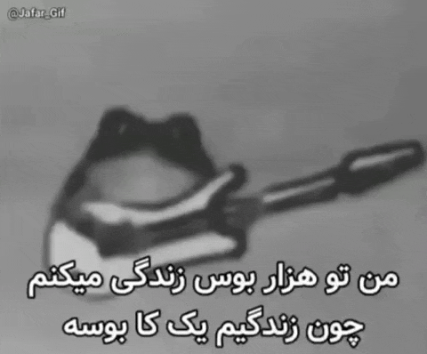 a black and white photo of a pair of scissors with a caption in a foreign language