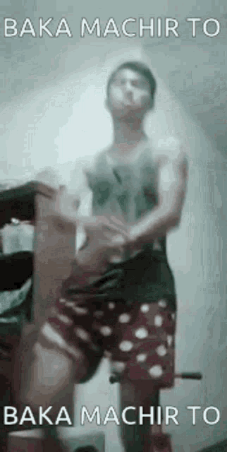 a man in polka dot shorts is dancing with the words baka machir to baka machir to on the bottom