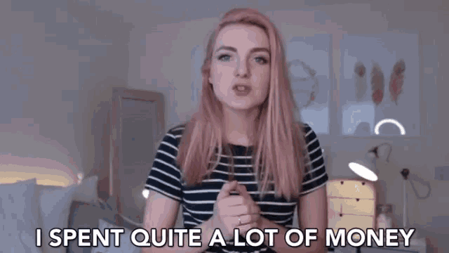 a woman in a striped shirt says " i spent quite a lot of money "