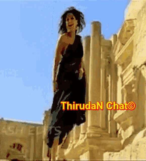 a woman in a black dress is standing in front of a building with the words thiruda n chat written above her